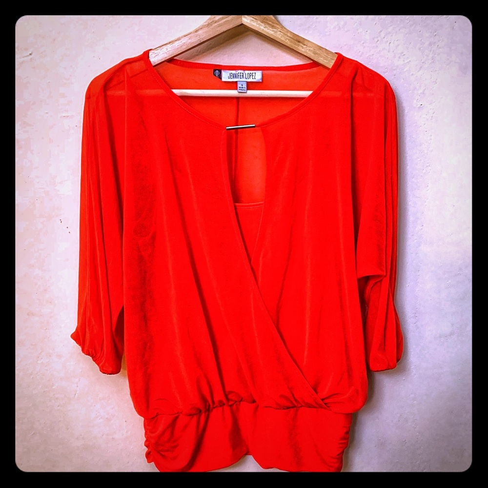 Orange blouse from JLO